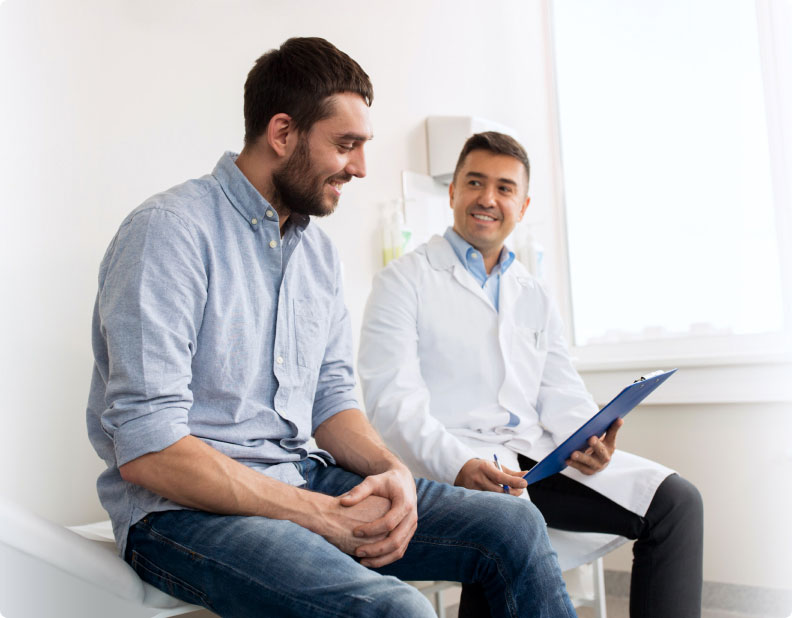 Man discussing options with a dentist